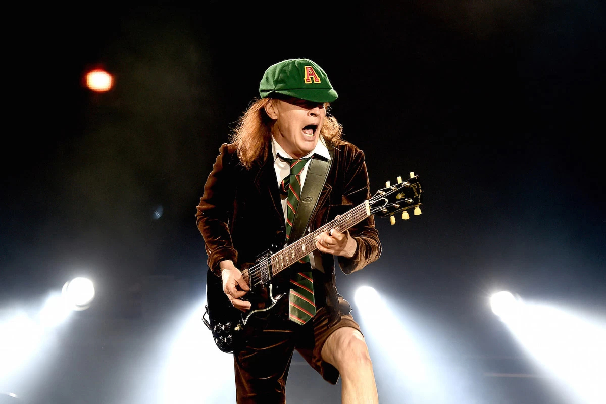 The True Story Of How AC/DC's Angus Young Decided To Wear School Uniforms -  Rock Celebrities